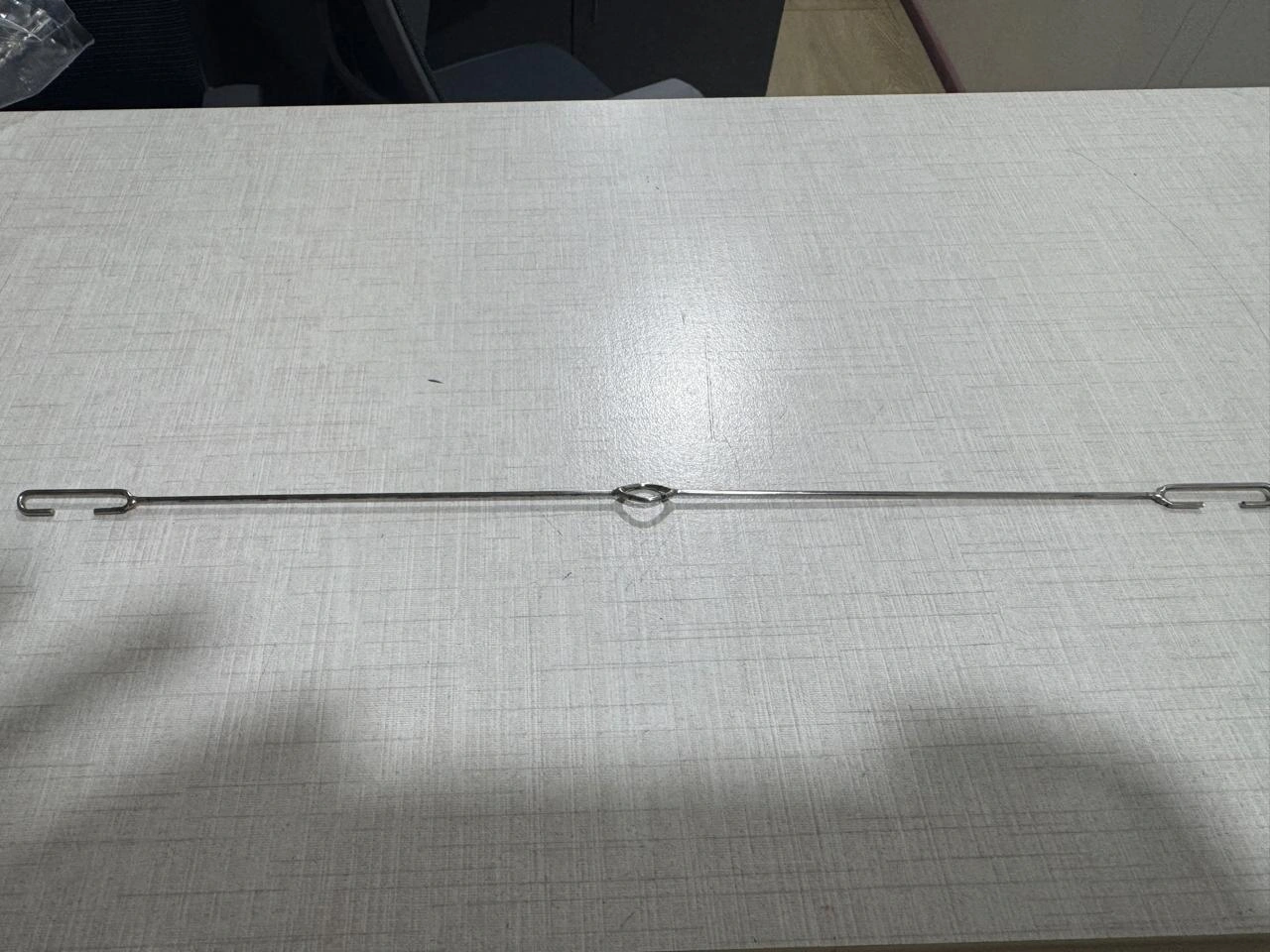WIRE HEALDS: Single Wire Hardened and Tempered Length: 331mm Dia: 1.6mm Both Loops "C" Type (27mm x 3.8mm) Center Eye: 9mm x 6.75mm Nickel Plated view 3